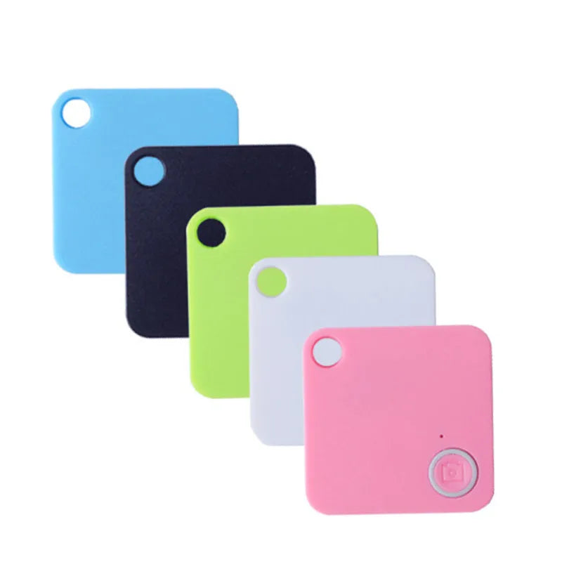 Anti-lost device in black ABS plastic, 38x38x7mm, with keyring attachment on white background