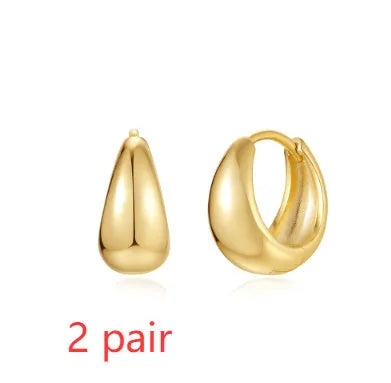 Golden brass diamond earclip earrings with geometric round design on copper base
