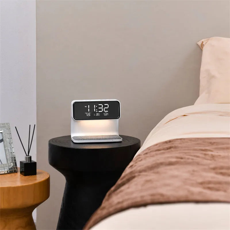 White 3-in-1 bedside lamp with wireless charging pad, LCD clock display, and touch controls.