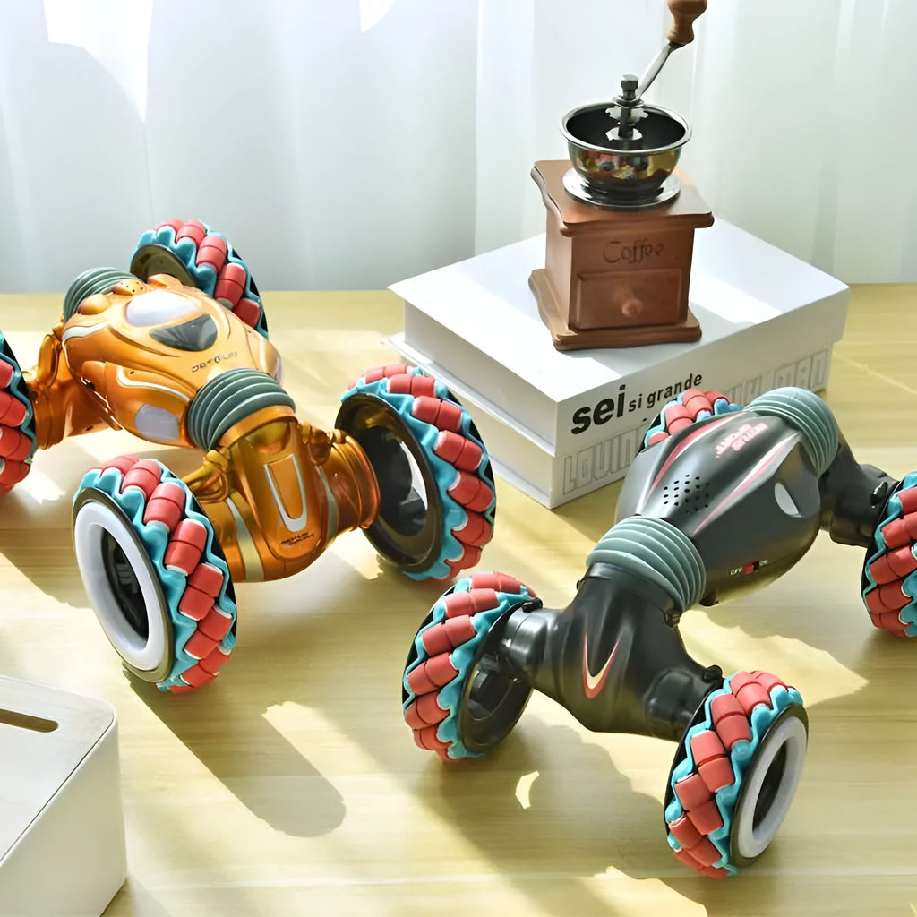 Remote control toy car with Steel Flying Dragon design, gesture sensing, deformation, and colourful hollow off-road wheels in black