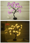 White and red PE cotton rose flower lamp with warm white LED lights on a table, with battery and USB power options.
