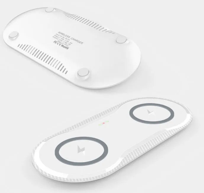 Black and white dual wireless charging pad for two phones with separate fast-charging coils