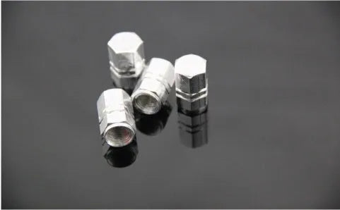 Set of five aluminium alloy car valve caps in black, blue, gold, red, and silver, designed for tyre valve stems with screw-on threading.