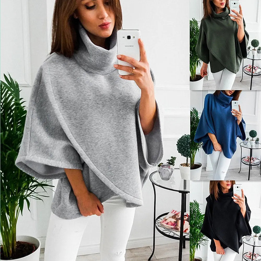 Longline women's cardigan with batwing sleeves and button front in grey.