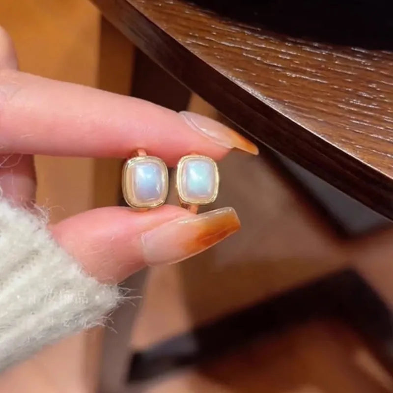 Copper geometric plated pearl ear clip earrings with electroplated coloured finish