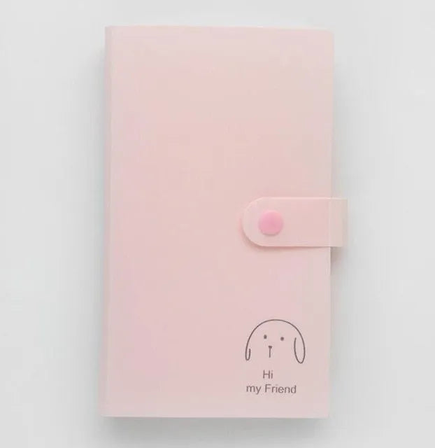 Blue PVC and PP business card holder book with protective shell, showing smile logo and insert slots.