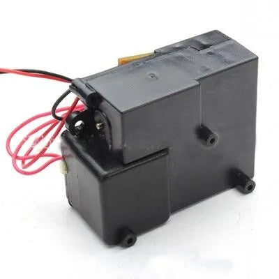 Black remote control tank model smoke box accessory with LED light on a model chassis.