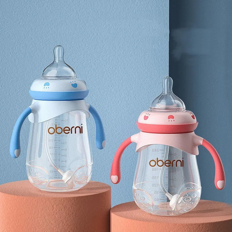 Wide neck anti-colic baby bottle with detachable handles in blue, green, and red colours