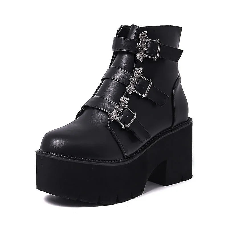 Black women's punk gothic Martin boots with bat buckle and side zip.