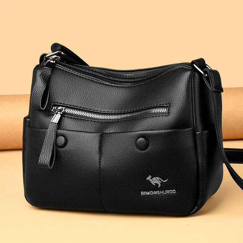 Soft PU leather women's crossbody shoulder bag in horizontal square shape with multiple internal pockets