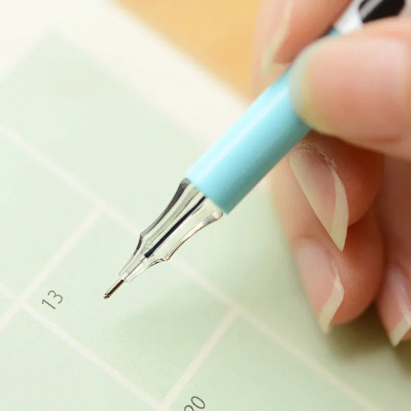 Set of 12 cow print design gel pens with 0.38mm tips in assorted colours laid out next to their box.