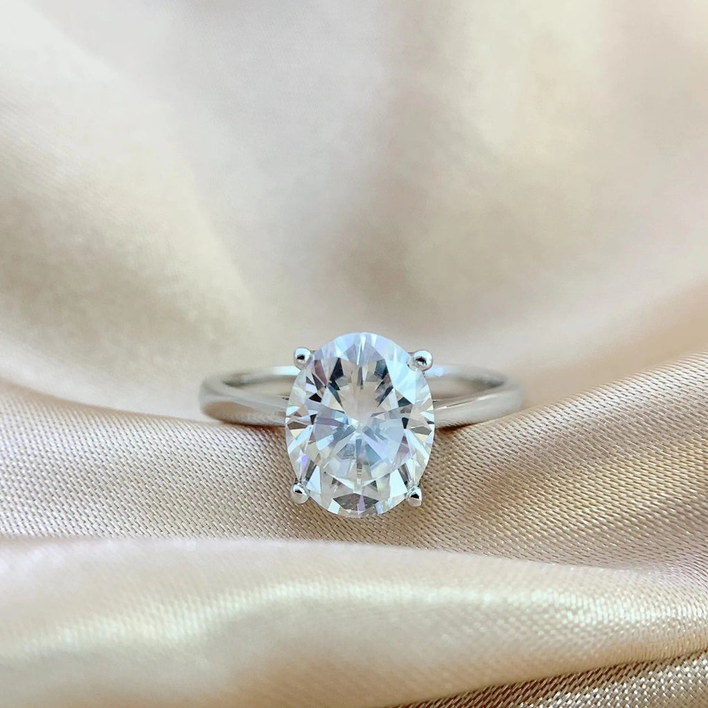 Oval moissanite ring in four-claw setting, D colour, electroplated band, sizes 5 to 9