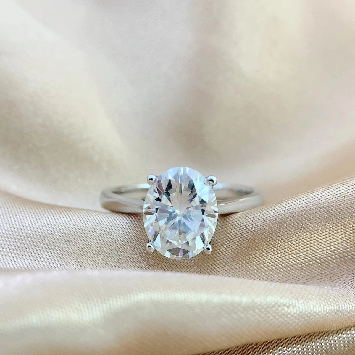 Oval moissanite ring in four-claw setting, D colour, electroplated band, sizes 5 to 9