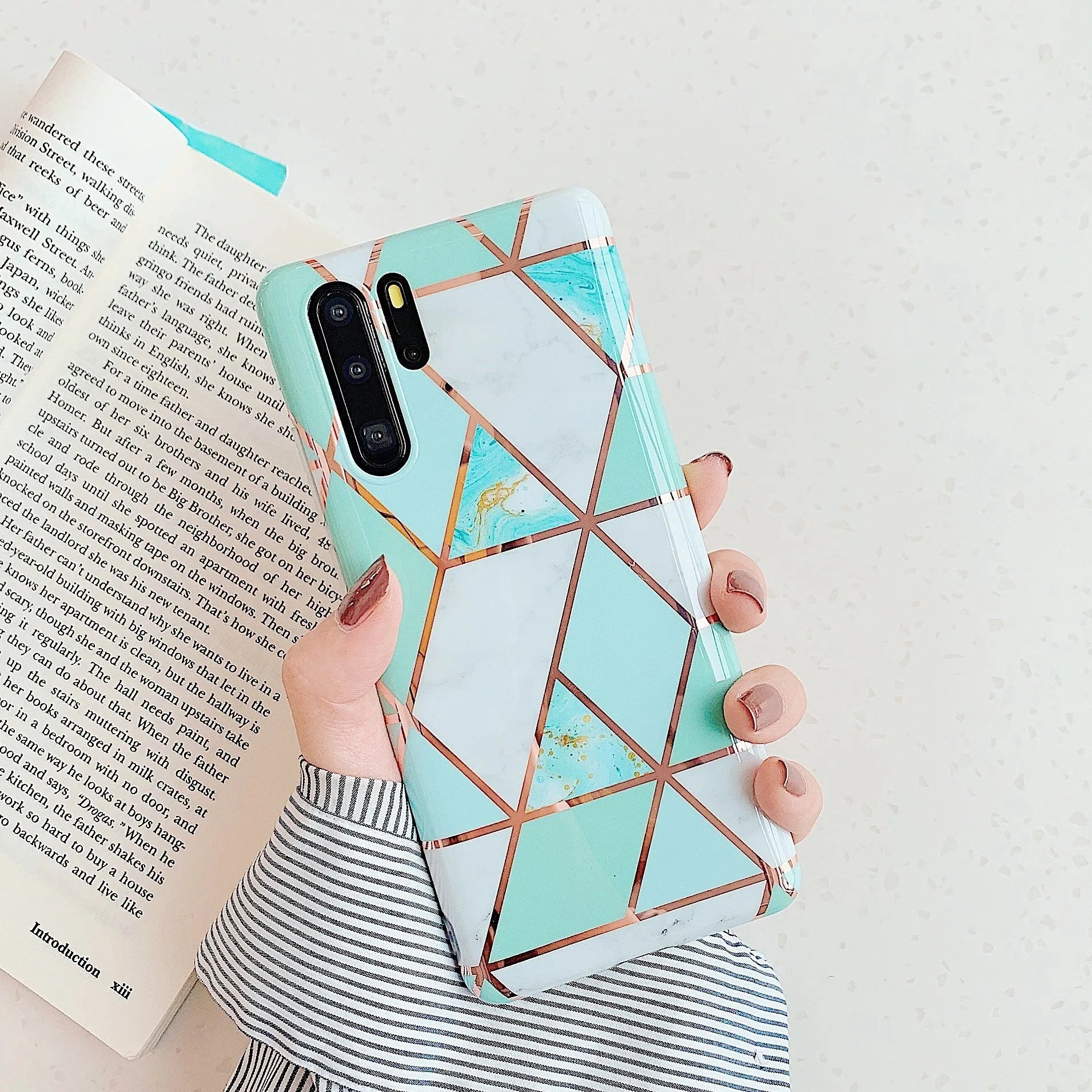 Electroplated marble finish TPU mobile phone case for Huawei and Samsung smartphones in various colours.