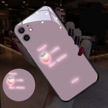 White luminous iPhone case with painted daisy design and voice-activated colour light feature.