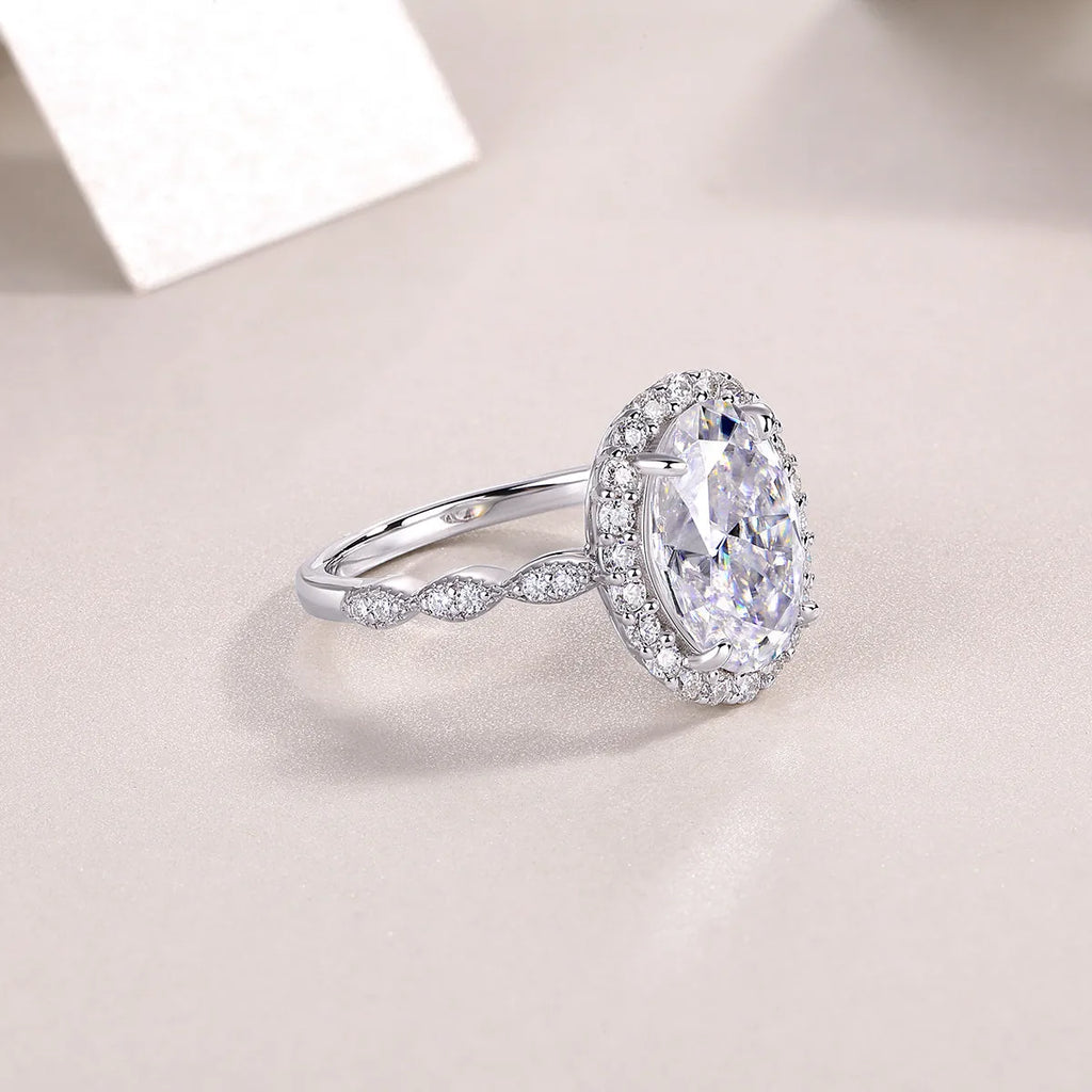 Egg-shaped moissanite wedding ring set in S925 silver with platinum plating, 8x12mm stone, sizes 5-9