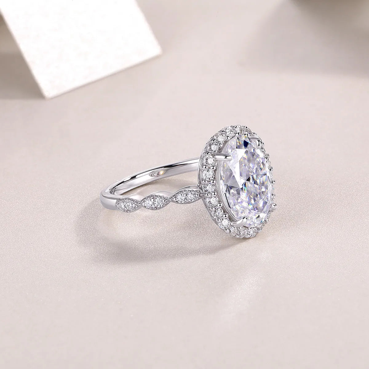 Egg-shaped moissanite wedding ring set in S925 silver with platinum plating, 8x12mm stone, sizes 5-9