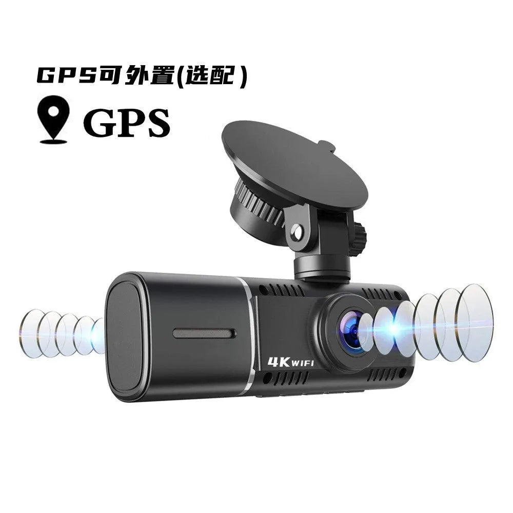 Black dual-channel car dash cam with 1.5-inch screen mounted on windshield next to rear-view mirror.