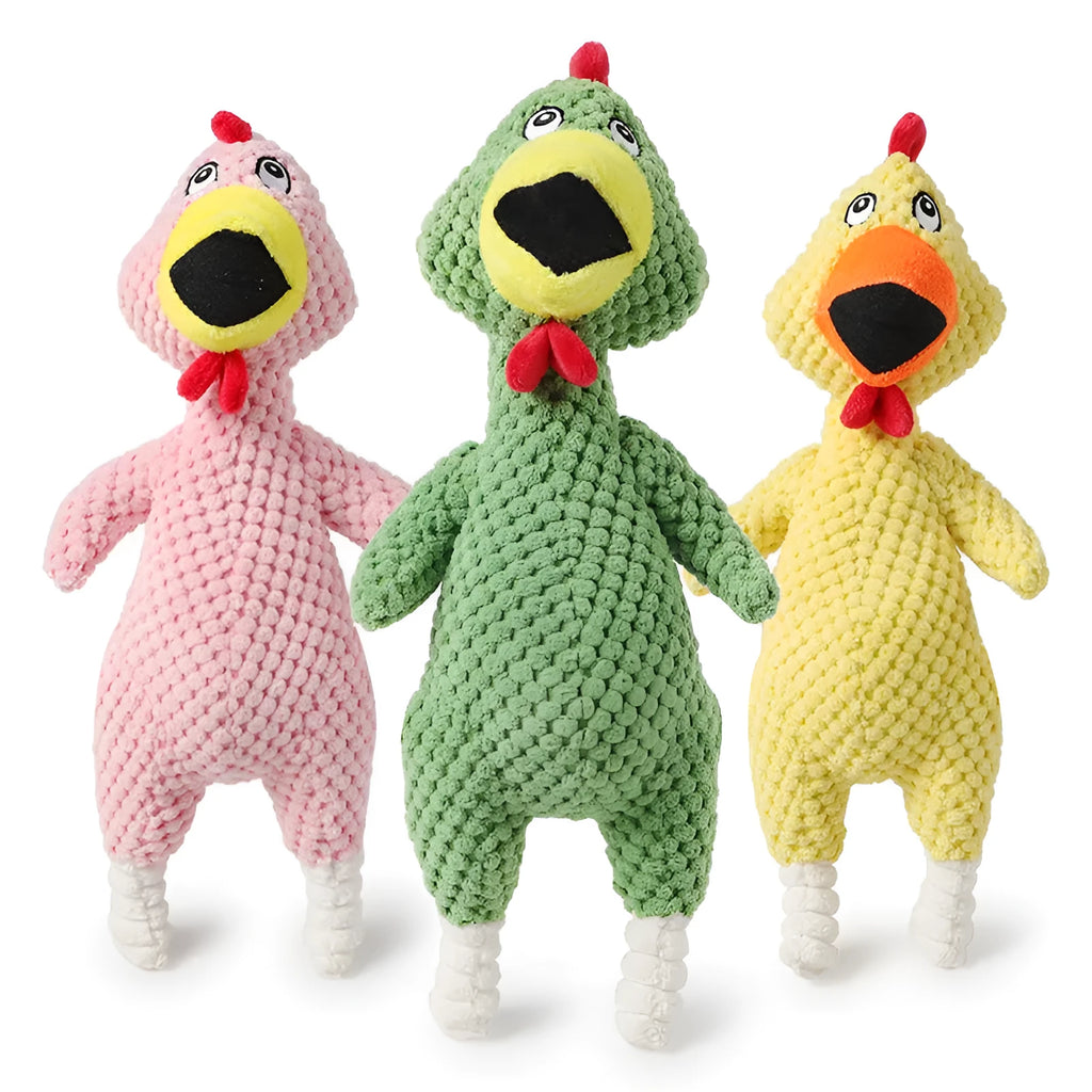 Soft pineapple fleece squeaker dog toy in yellow, green, and pink on a plain background