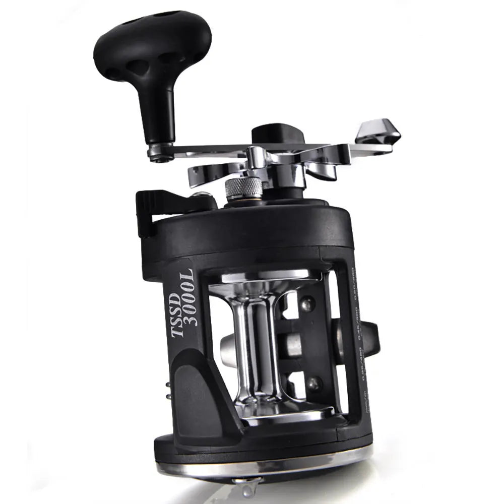 Black right-hand trolling fishing reel for saltwater, metal body, 3.8:1 gear ratio, star drag, 8.2 x 9.2cm