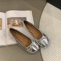Women's split-toe flat shoes in round toe design, shown in available colours: black, silver, beige, and red.
