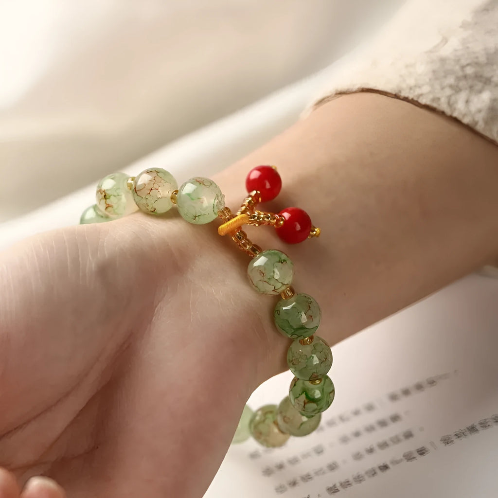 Women's ceramic woven bracelet with geometric crystal beads in five colours: brown, green, light blue, pink, purple