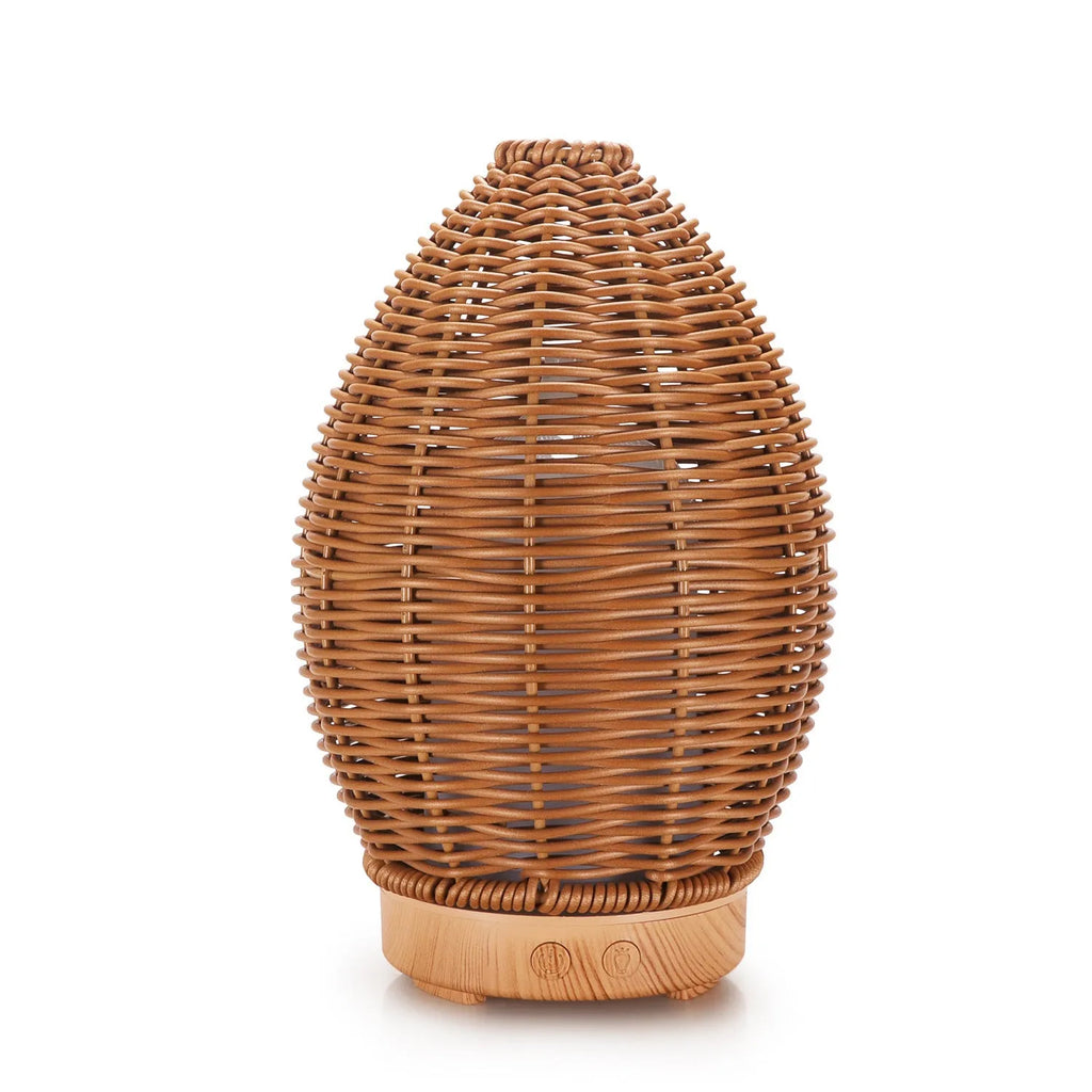 Hollow rattan aroma diffuser with light wood grain finish, showing 100ml water tank