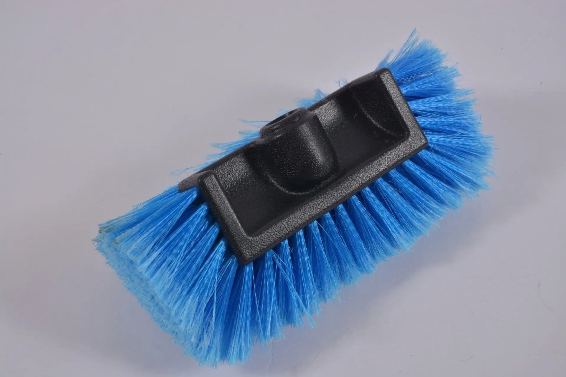 Yellow portable car wash brush with four-section removable rod and flow-through brush head design