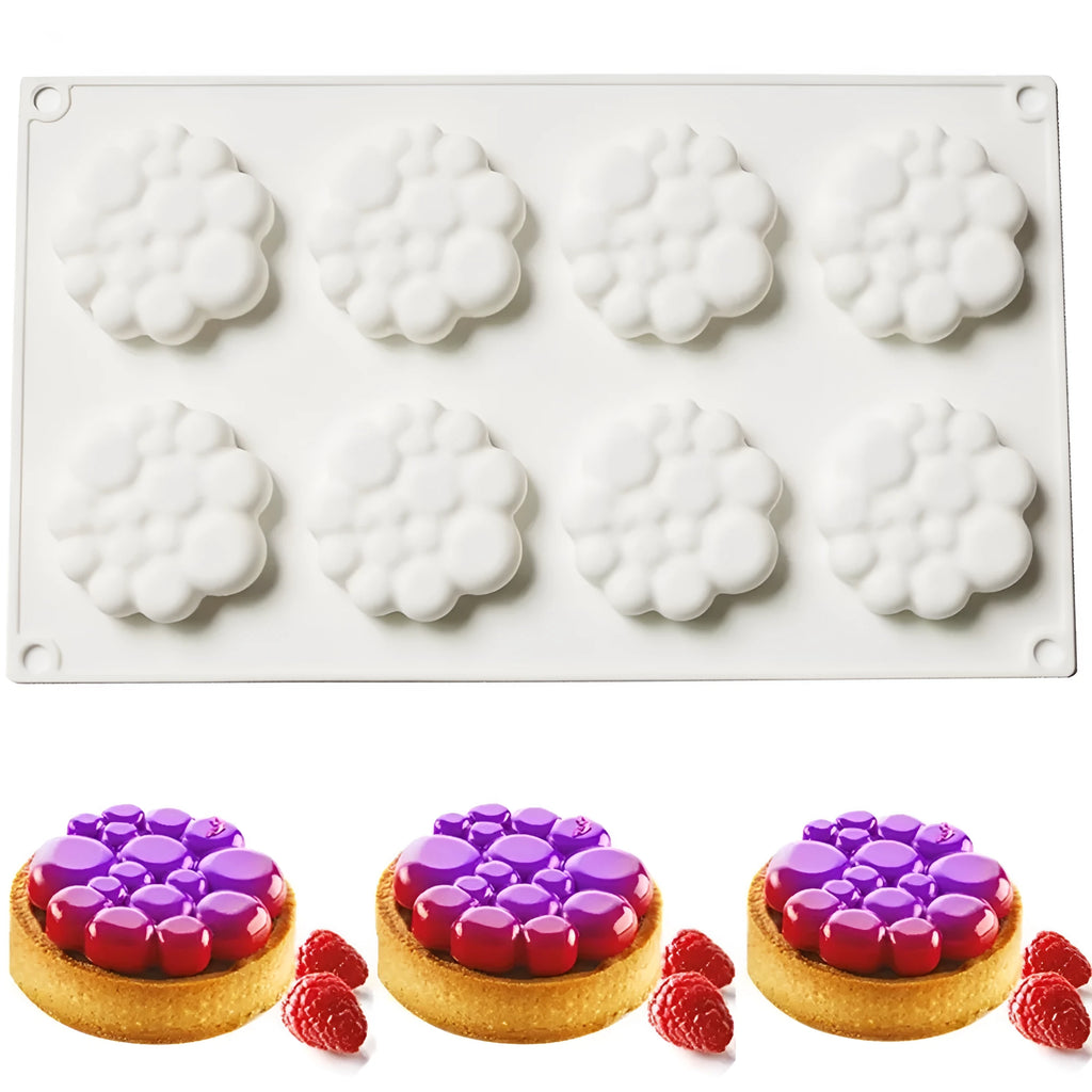 Round silicone cake mould with bubble tower pattern showing 8 raised decorative bubbles