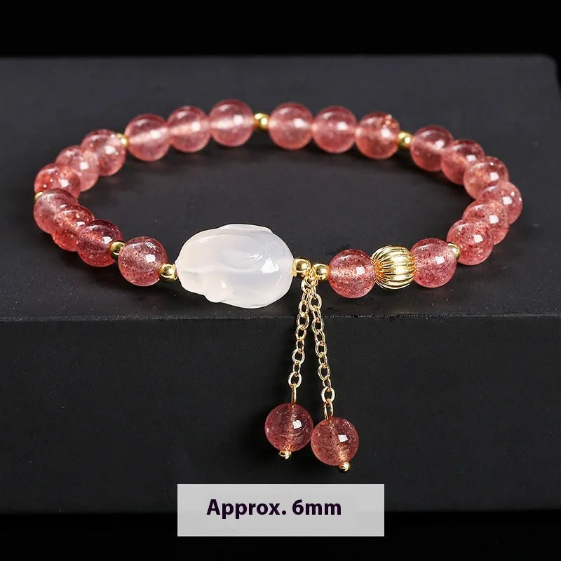 Strawberry quartz agate white rabbit bracelet with 6mm beads, geometric round design.
