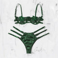 Women's half cup unlined bra and brief set in black with flower pattern and fitted straps