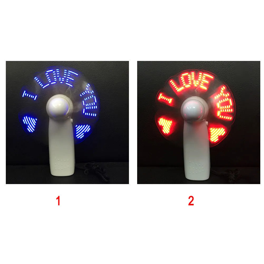 White handheld mini fan with flashing blue and red LED 'I Love You' text on a clear display panel.
