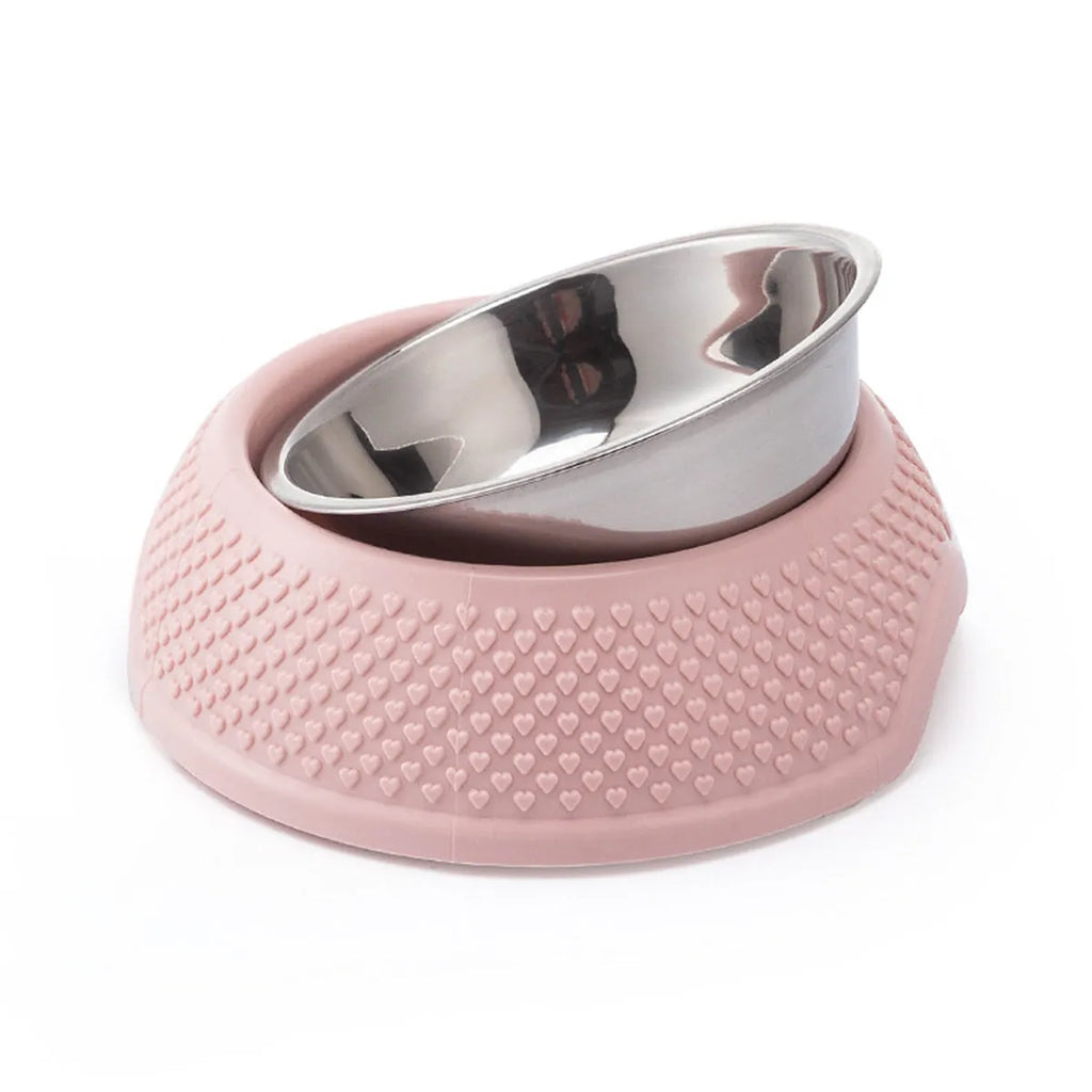 Blue stainless steel pet bowl with a non-slip base for cats and dogs on a floor.