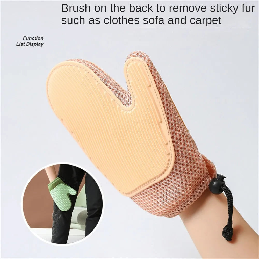 Dark blue mesh pet hair removal glove for grooming cats and dogs on a hand.
