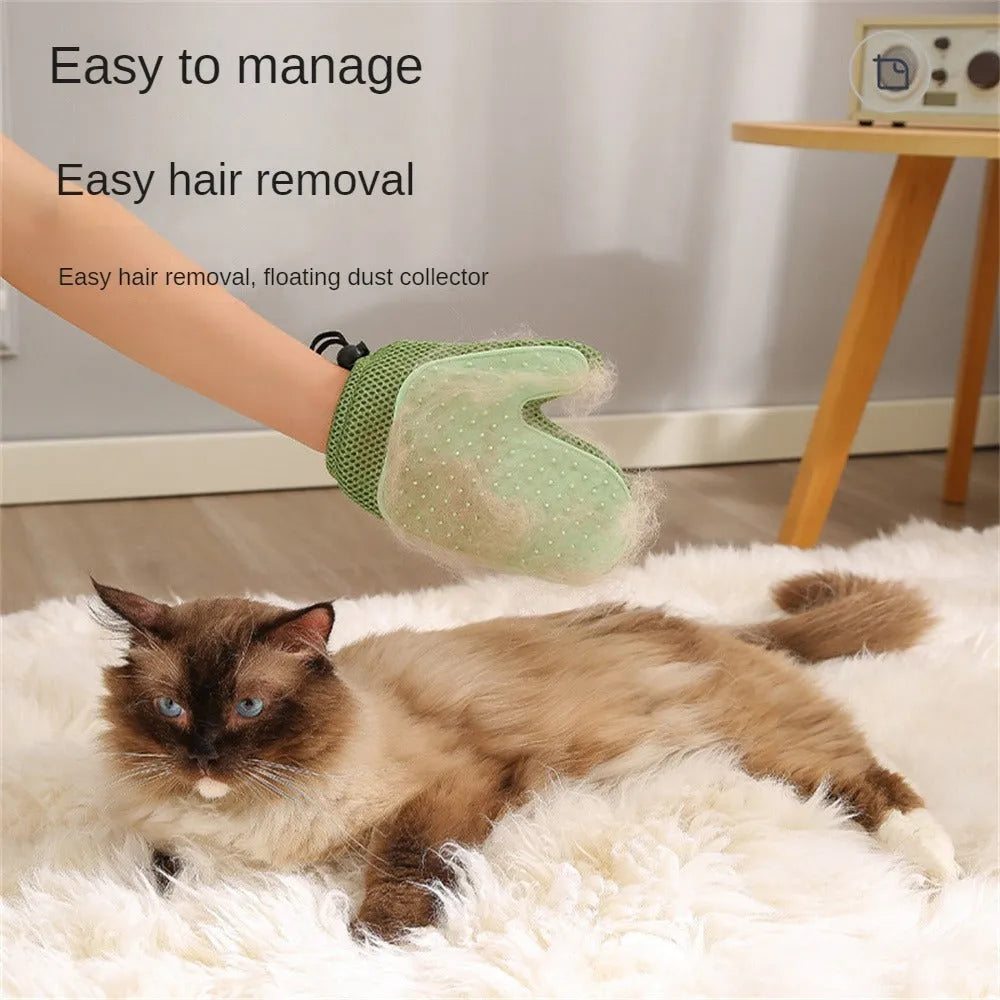 Dark blue mesh pet hair removal glove for grooming cats and dogs on a hand.