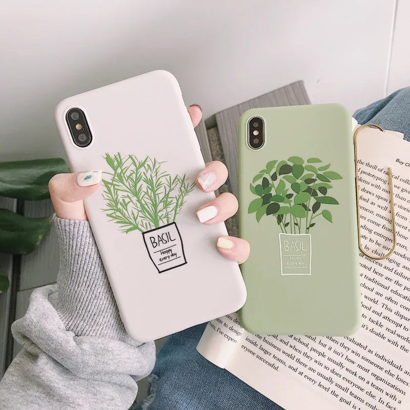 White silicone iPhone case with detailed painted plant design on the back