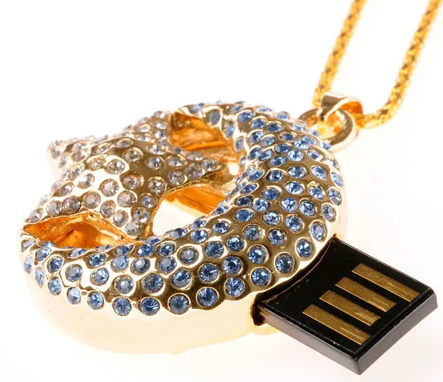 Silver Jewelry Xingyue metal USB flash drive with USB Type-A connector on a plain background.