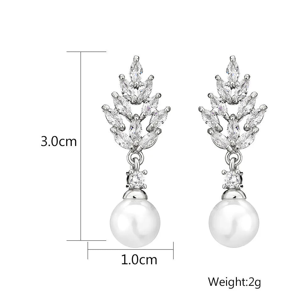 Geometric flower earrings with micro inlaid zircon in gold, rose gold, and white gold plated finishes.