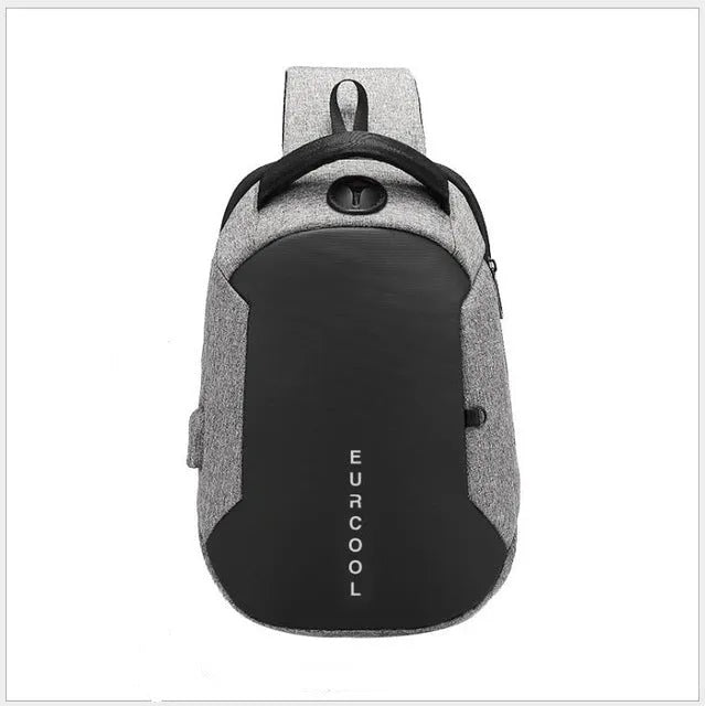 Men's black Oxford crossbody bag with USB charging port and multiple zipped pockets.