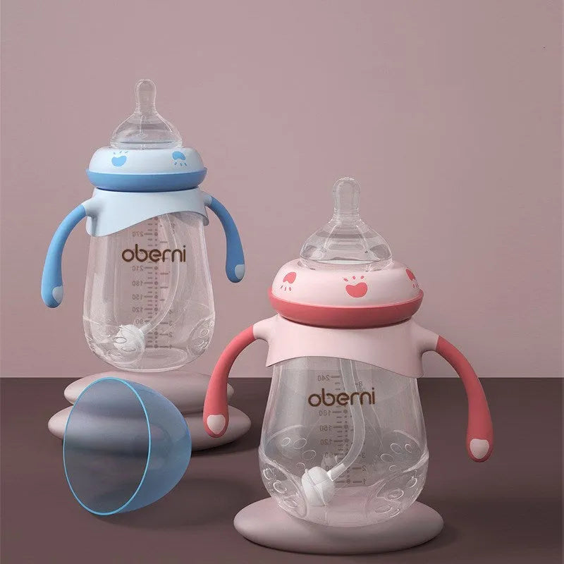 Wide neck anti-colic baby bottle with detachable handles in blue, green, and red colours