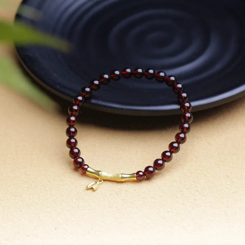 Handmade natural garnet bamboo joint bracelet in copper or silver finish, 6mm bead size.