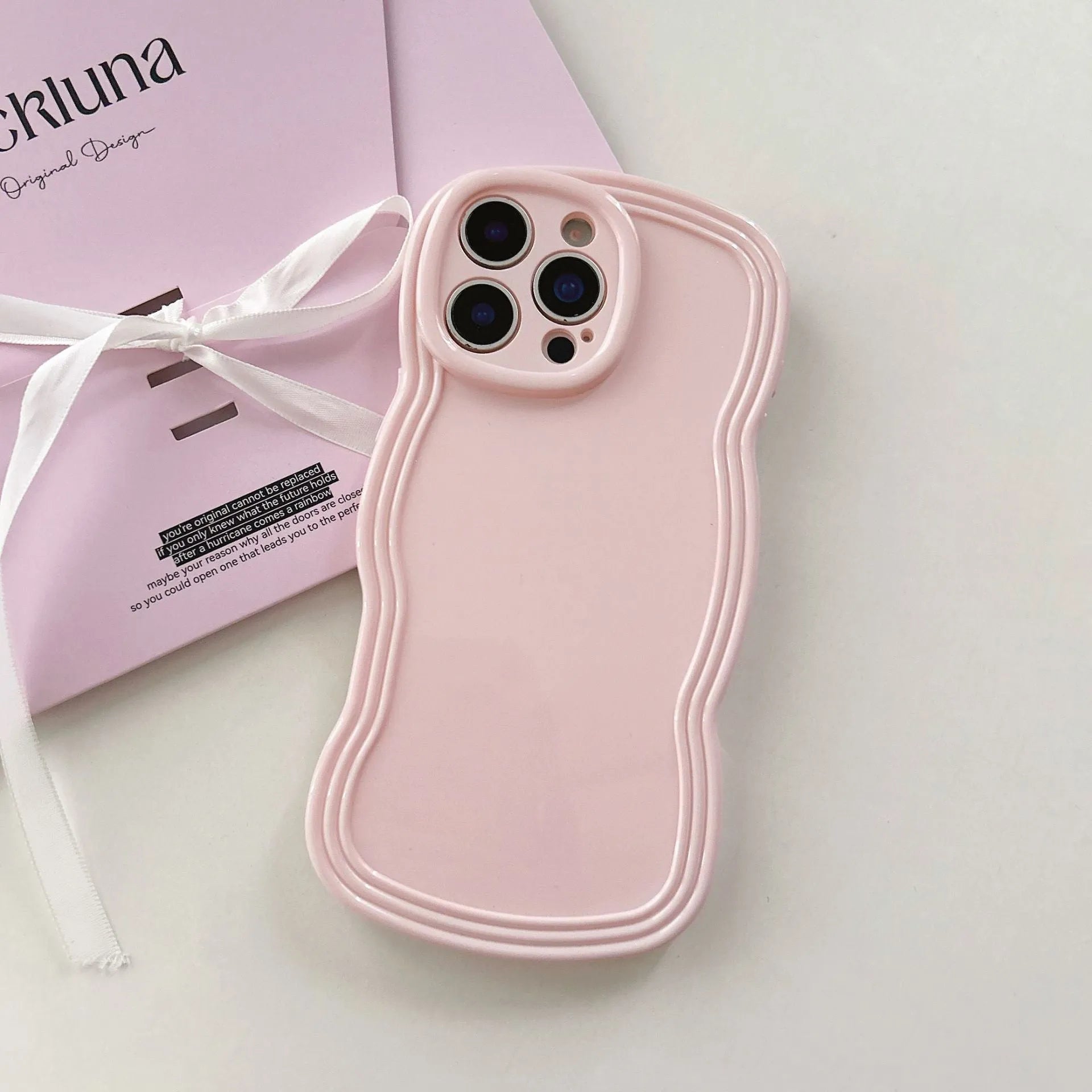 Pastel coloured candy wave pattern TPU phone case for iPhone on a white background.