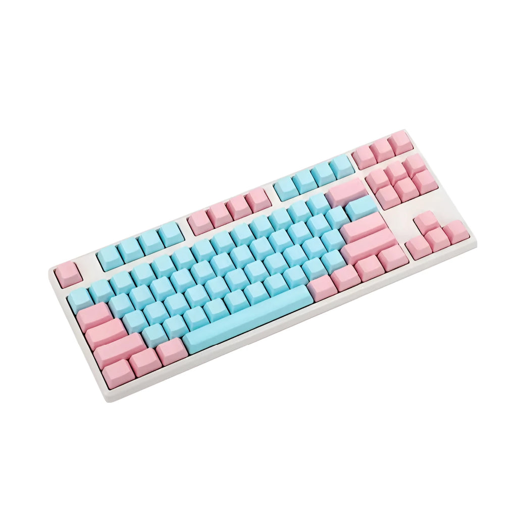 Pink PBT mechanical keyboard keycaps with side-engraved legends showing 1.5mm thickness