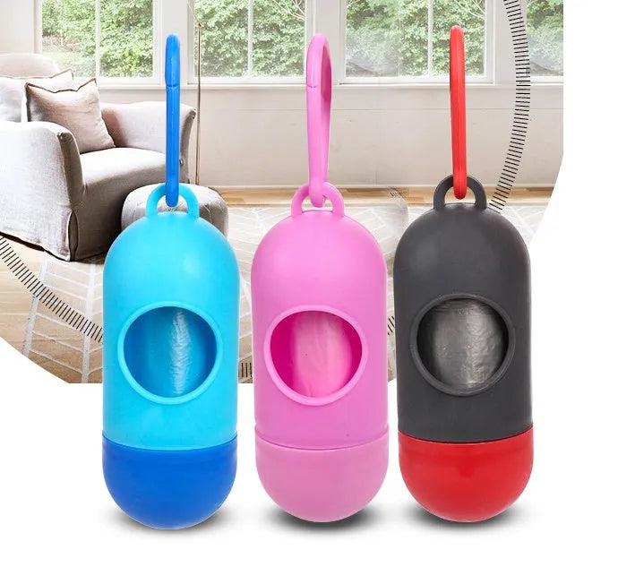 Roll of coloured pet waste disposal bags showing size of 22.5 by 30 centimetres