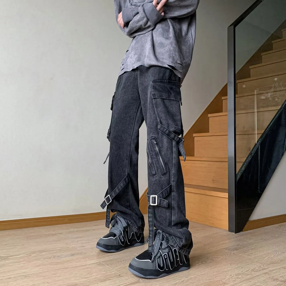 Men's loose-fit black jeans with zip and lace-up front, mid waist and long pant length