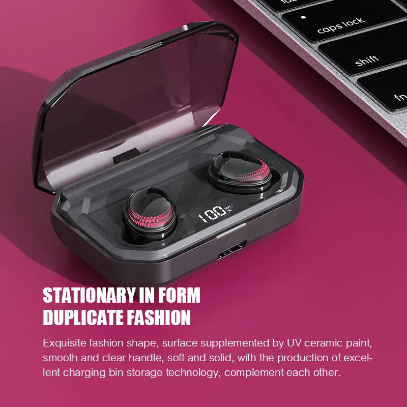 Black single earpiece Bluetooth headset with its charging case on a white background.