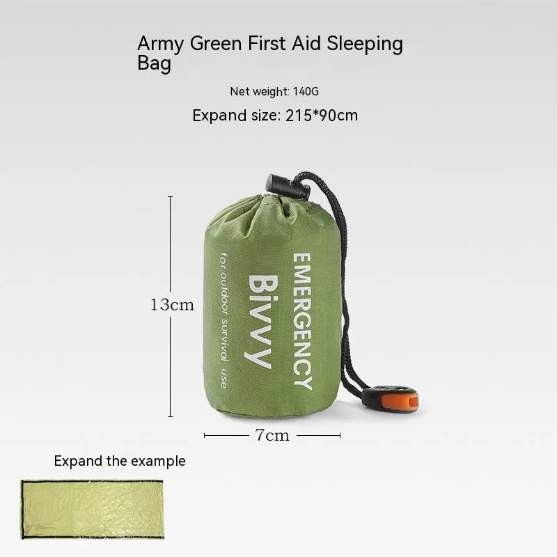 Orange and green emergency tent, sleeping bag, and raincoat kit for outdoor survival.