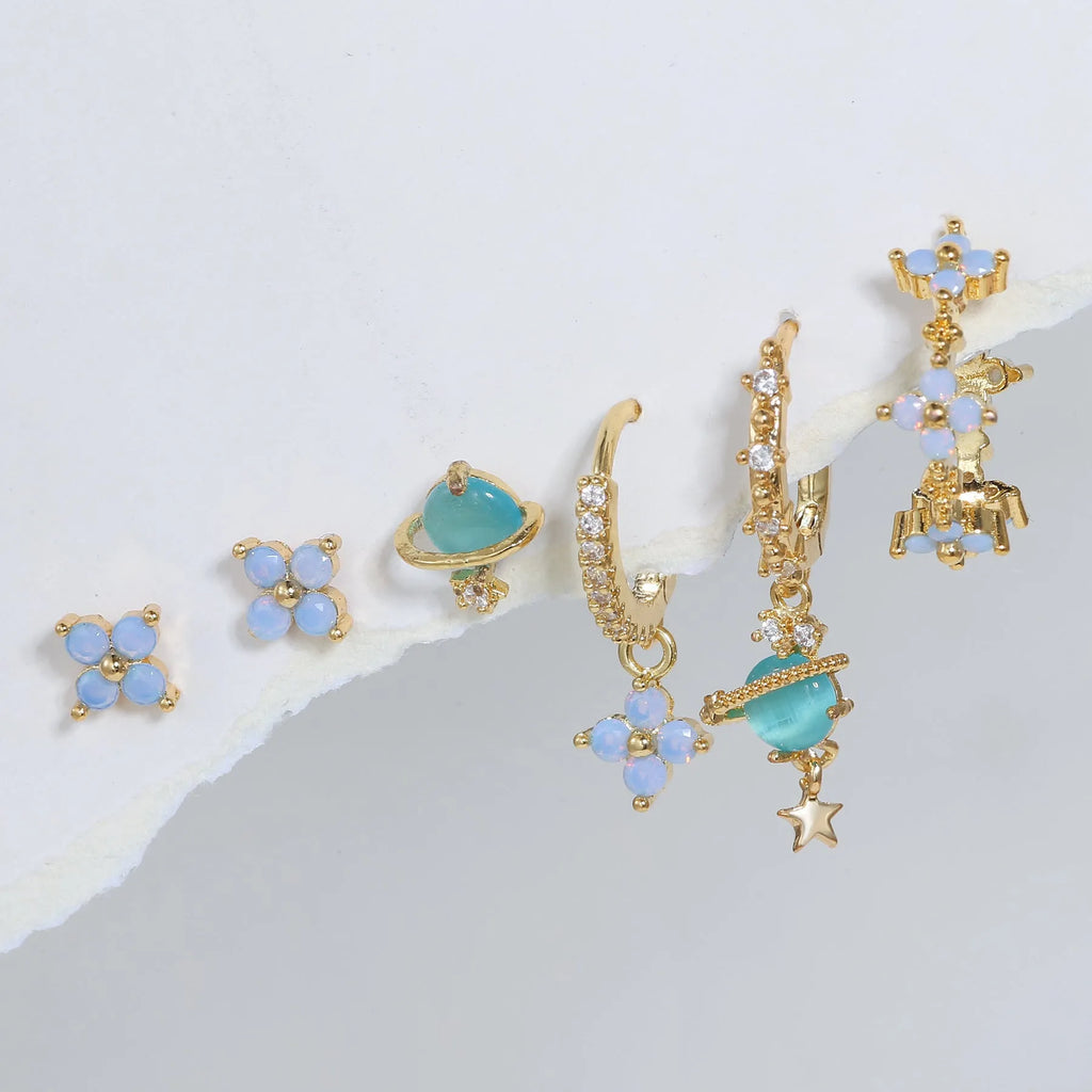 Gold and silver flower-shaped ear studs with zircon mosaic detail, Japanese Korean sweet girl style.