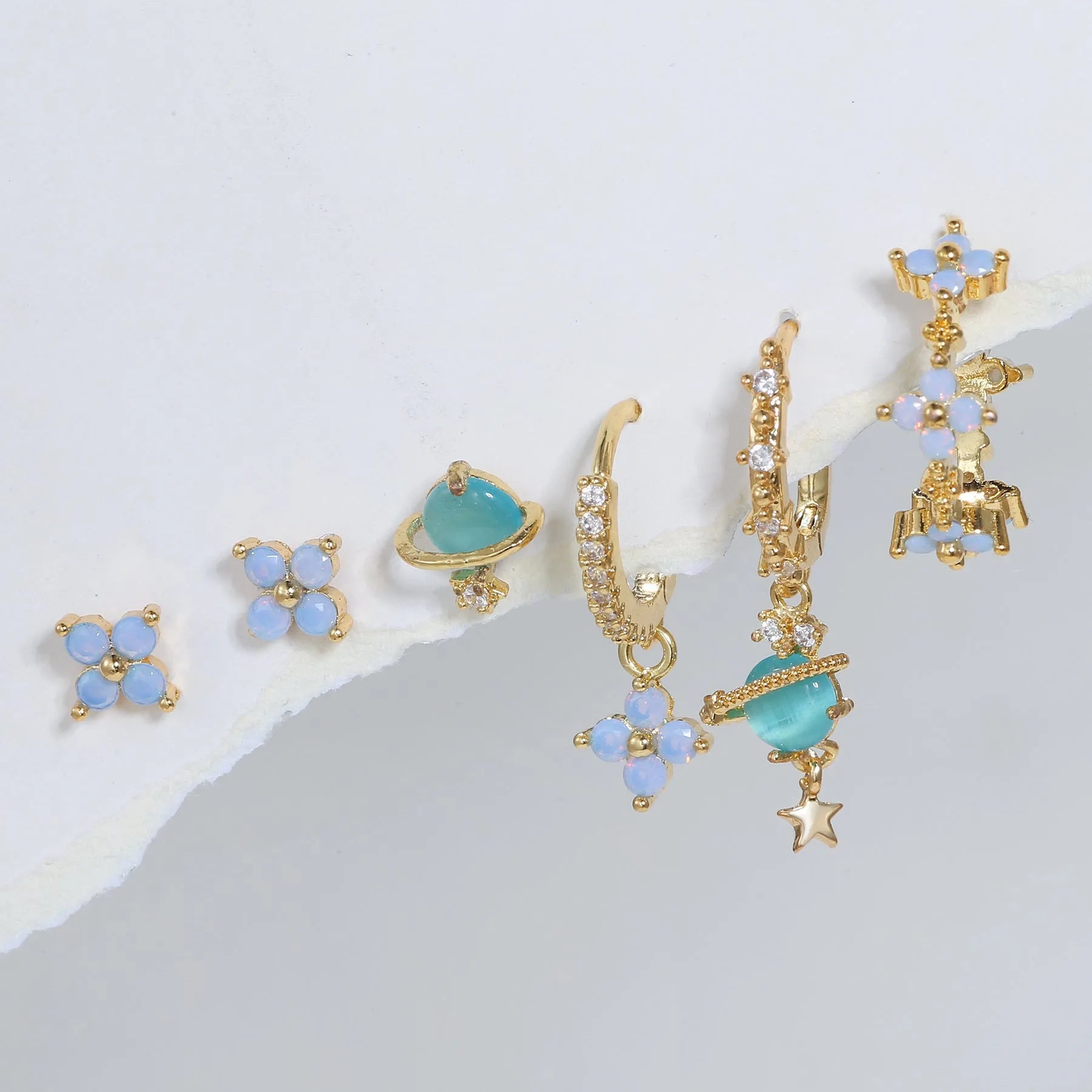 Gold and silver flower-shaped ear studs with zircon mosaic detail, Japanese Korean sweet girl style.