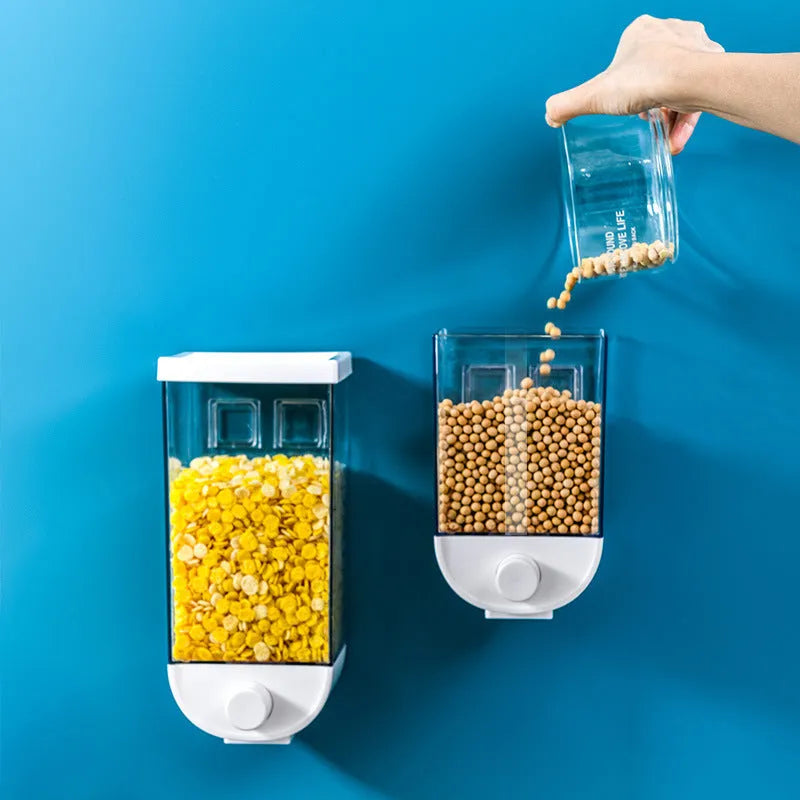 Clear plastic wall-mounted kitchen food storage container with easy-press lid for cereals and dry goods.
